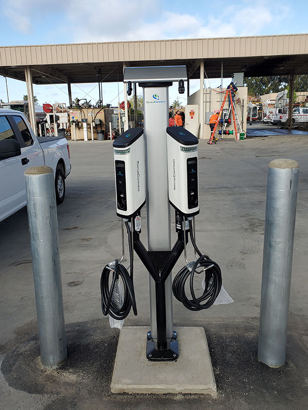 EV charging station installed by Synergy 768 for commercial solar energy solutions.